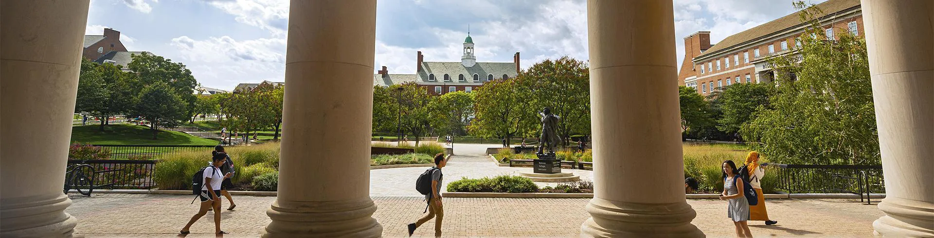 Hornbake Plaza viewed through columns of Hornbake Library