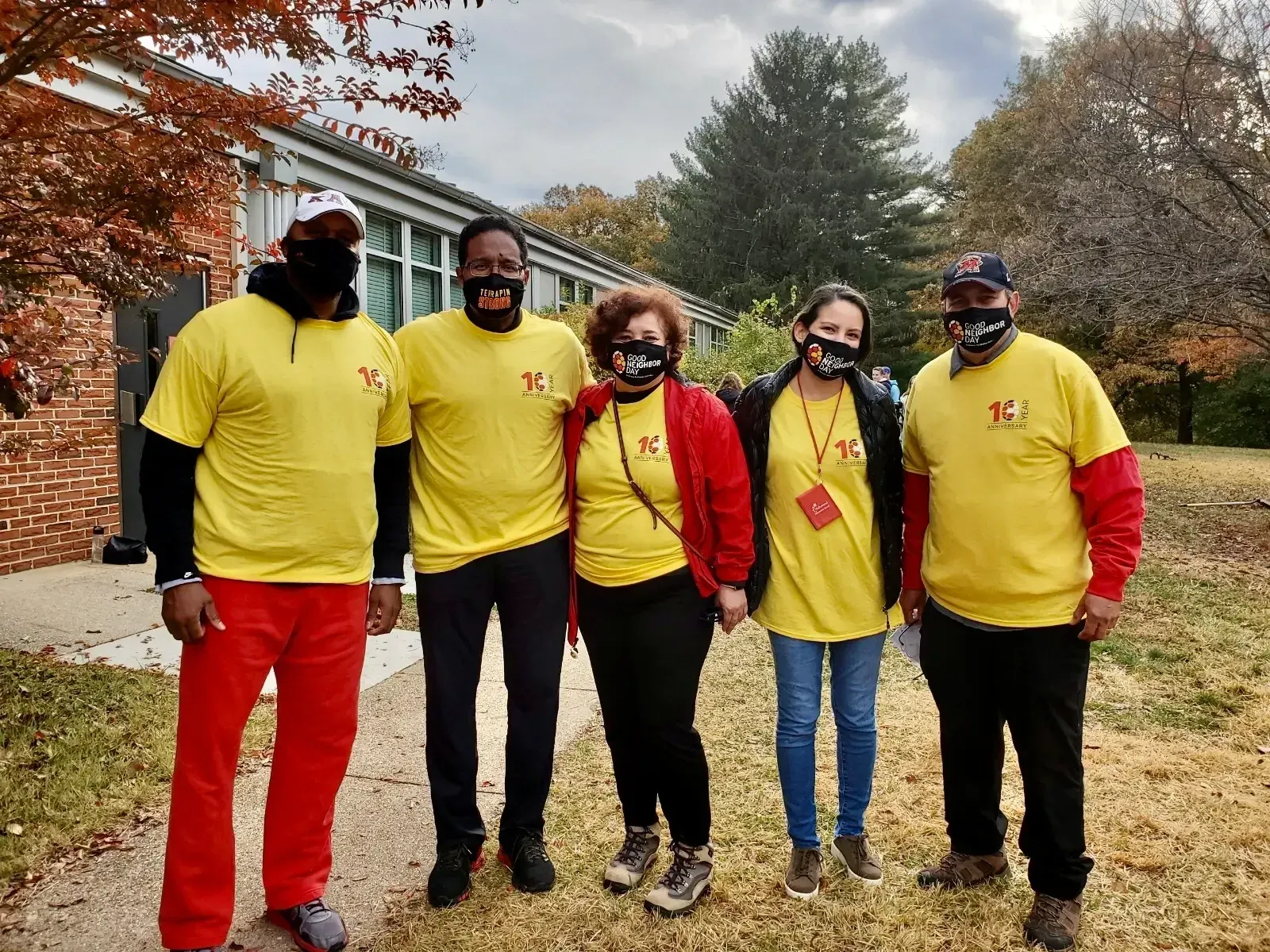 Five Good Neighbor Day Volunteers standing next to each other