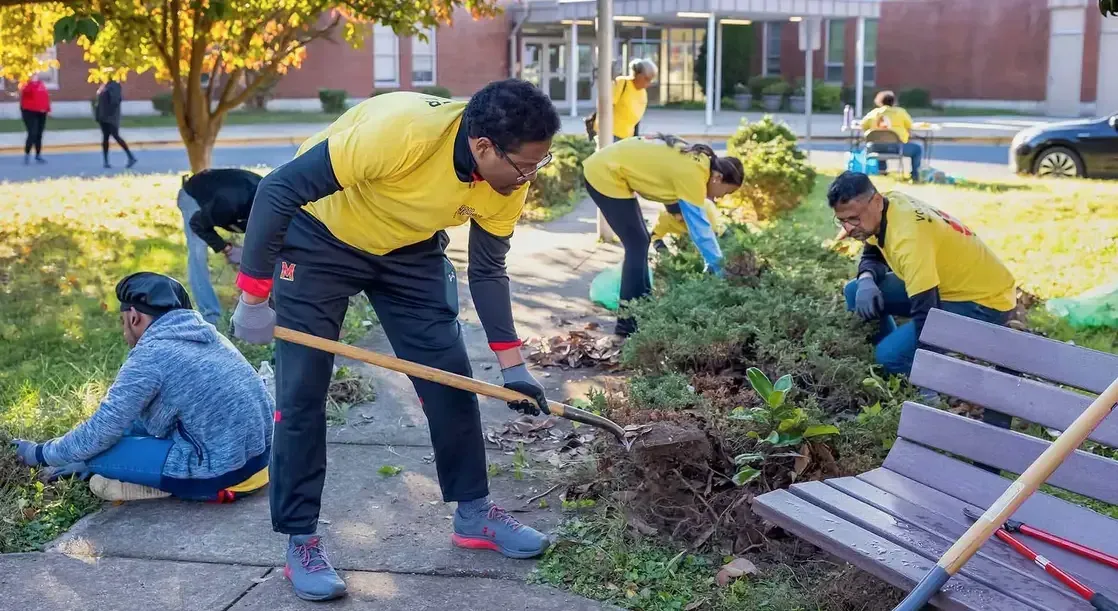 UMD President Pines participating in Good Neighbor Day 2023.