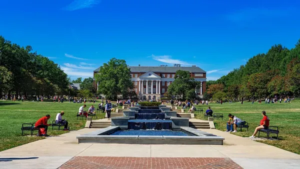 UMD Students on McKeldin Mall sitting next to the fountain