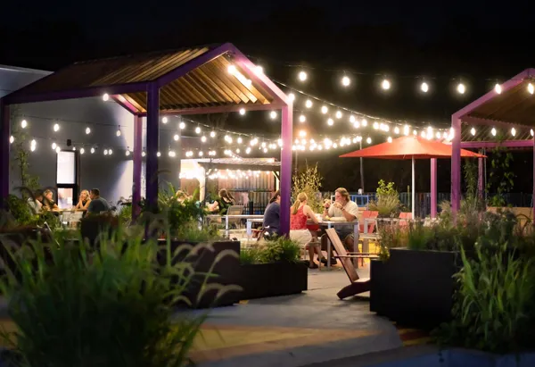 Discovery District Park Night with string lights above